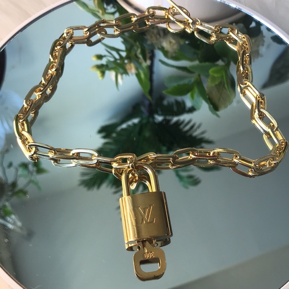 LOUIS VUITTON LOCK # 300 WITH GOLD TONED CHAIN - Picture 11 of 11